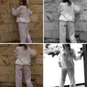 One of my models wearing white transparent wind suit