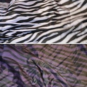 Nike shiny nylon zebra pants