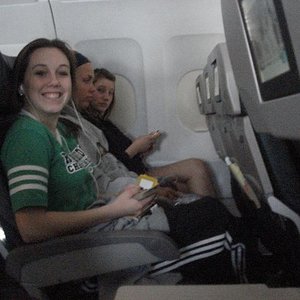 Adidas black pants green shirt smile