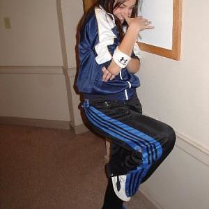 Adidas black pants blue stripe camera shy