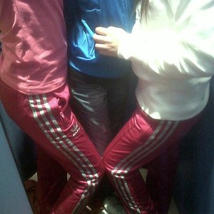 Adidas womans red pants twin knee shot