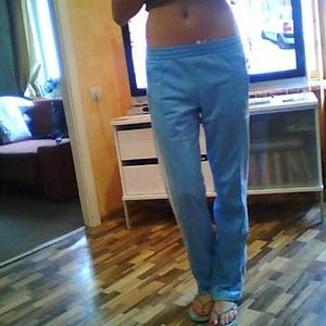 Adidas womans light blue pants barefoot front shot