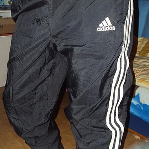 Adidas womans baggy black pants with white stripes small front logo