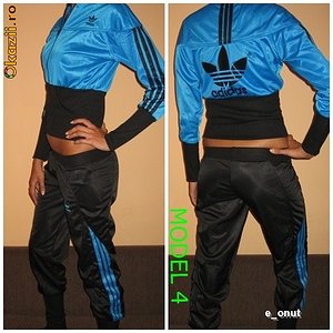 Adidas womans  two piece suit two shot pose blue trim top