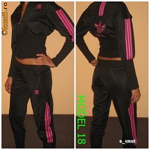 Adidas womans two piece black suit with pink trim two shot pose