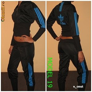 Adidas womans two piece black suit with blue trim two shot pose