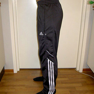 Adidas womans black pants with white trim solid top