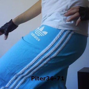 Adidas womans light blue pants white top biker gloves side