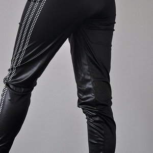 Adidas womans tight shiny black pants with white stripes small logo rear