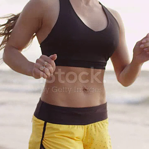 following-shot-of-running-girl-in-beach-at-sunset-time-video-id673525016.mp4