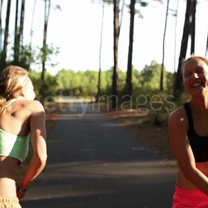 two-female-athletes-giving-each-other-high-fives-in-the-forest-by-the-video-id497430036.mp4