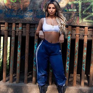 blue adidas pants with boots