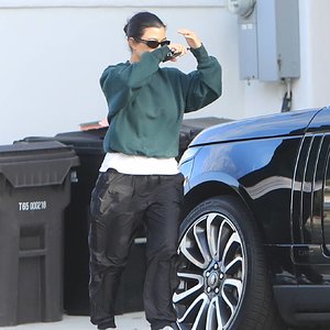 Kourtney+Kardashian-leaving+the+her+home-oversized+emerald+green+sweatshirt-grey+New+Balance+s...jpg