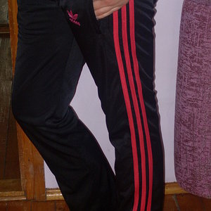 Adidas womans shiny black pants with red trim side