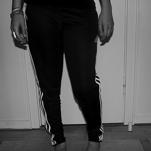 Adidas womens black and white pants shot in black and white