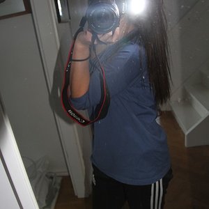 Adidas womens black pants with blue top semi side angle