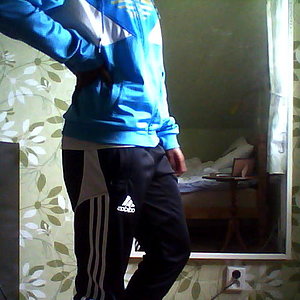 Adidas womens black pants blue long sleeve top side pose