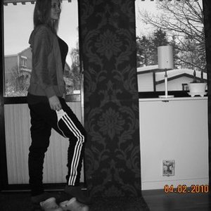 Adidas womens black pants with white stripes black and white semi side angle