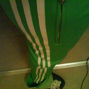 Adidas womens green pants close side zipper shot