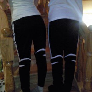 Adidas womens black pants with white trim stripes twins