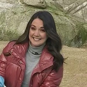 Laura Tobin red down jacket