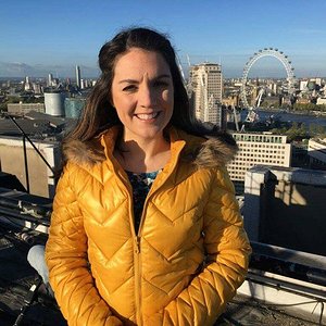 Laura Tobin yellow down jacket
