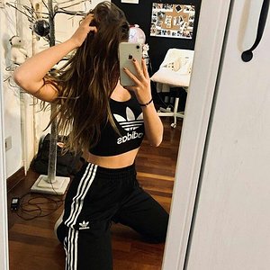 Hot girl showing her adidas gear