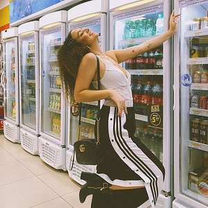 Sexy girl parading in her adibreak pants