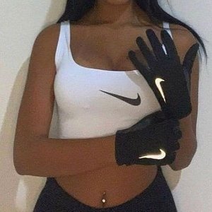 Nasty girl teasing with her sporty gloves