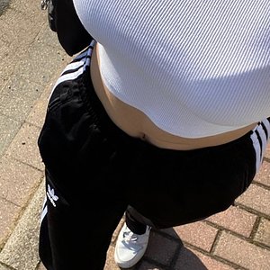 Sexy girl in adidas polyester pants