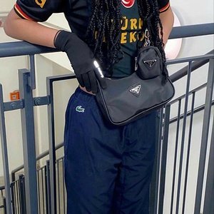 Hot girl in nike gloves and trackpants