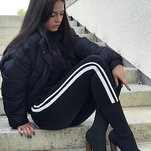 Sexy girl checking her sporty outfit