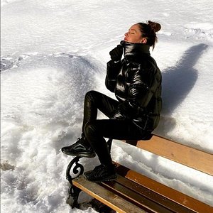 Sexy girl feeling good in her shiny outfit