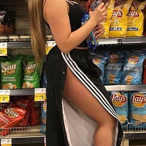 Hot girl parading in her adidas poppers