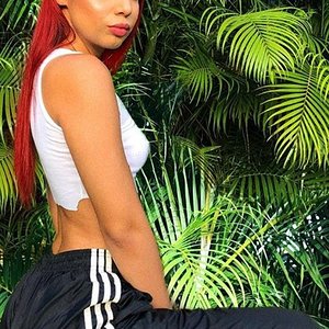 Hot girl teasing with her adidas pants