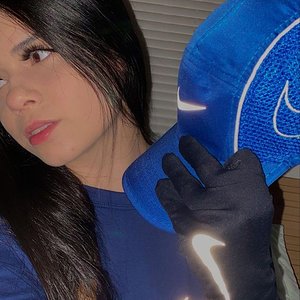 Hot girl in shiny nike gloves