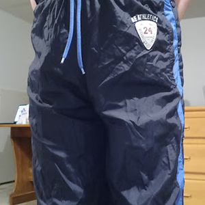 Me in my American Eagle AE Outfitter Dark Blue Nylon Pants (with my hands behind my back) 1