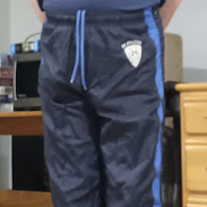 Me in American Eagle AE Outfitter Dark Blue Nylon Pants 2 (with my hands behind my back) 2