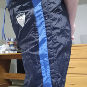 Me in American Eagle AE Outfitter Dark Blue Nylon Pants (with my hands behind my back) 3