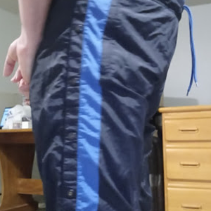 Me in American Eagle AE Outfitter Dark Blue Nylon Pants (with my hands behind my back) 4