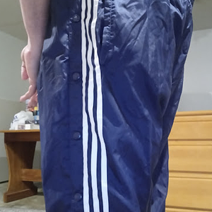 Me in my Dark Blue Adidas Nylon Pants with my hands behind my back 4