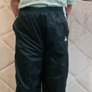 Me in my Medium Forest Green Adidas Nylon Pants (with my hands behind my back) 2.png