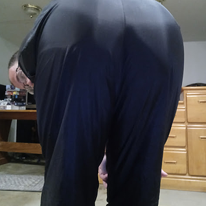 Me bending over in my Medium Black Asics Nylon Pants 1