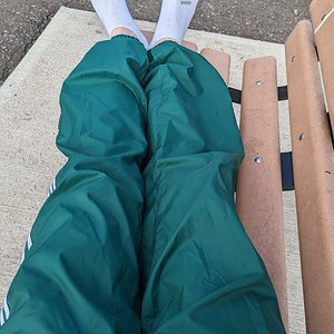 Unlined swishy pants and white ankle socks