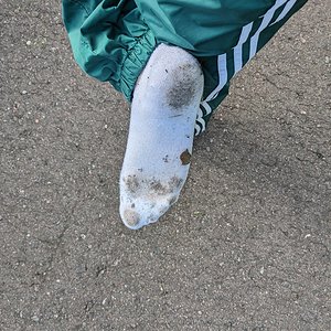 Swishy pants and white ankle socks