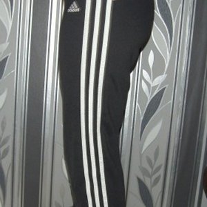Adidas womens black and white pants shot