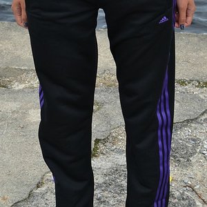 Adidas womens  black tight pants purple front view