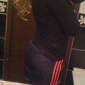 Adidas womens balck pants red stripe angle back photo