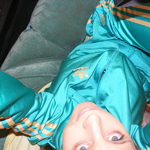 Adidas womens track suit green high angle look