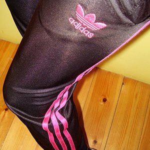 Adidas womens black pants small pink logo side angle shot